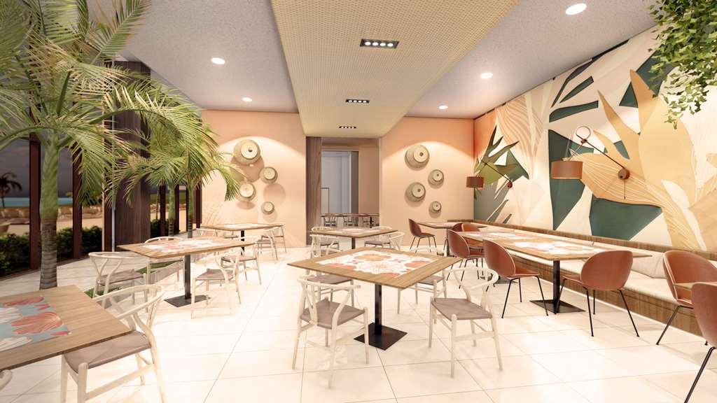 Hilton Garden Inn لا رومانا المطعم الصورة